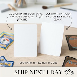 May include: Two blank white rectangular trading cards with rounded corners, each measuring 2.5 by 3.5 inches. The cards are positioned upright on a surface, surrounded by various illustrated trading cards with colourful graphics and text.