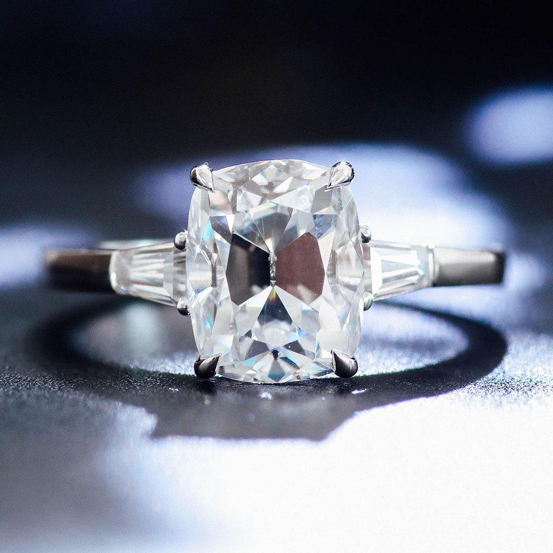 Cushion cut with side baguettes best sale