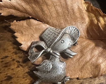 Adorable, vintage Duckling with a bonnet Pin/brooch. Sterling silver.