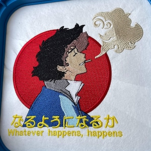 May include: Embroidered design featuring an anime character with black hair, a blue jacket, and a cigarette. The design includes a red circle and a cloud-like shape. Text in Japanese and English reads "Whatever happens, happens."