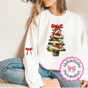 Christmas Tree Sweatshirt with Red Bows, Festive Holiday Apparel with Bow Accents, Perfect for Holiday Celebrations, Ideal Christmas Gift