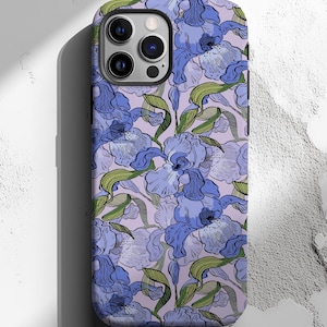 May include: A phone case featuring a repeating pattern of blue iris flowers with green leaves on a light purple background. The case has a glossy finish and a camera cutout.