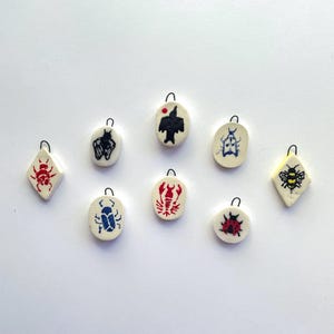 Ceramic charms- critter variety, handmade tiny pendants