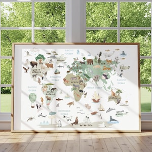 May include: A framed world map illustration with a light wood frame. The map features continents in shades of green and beige, with animal and landmark illustrations. Oceans are labeled, and the map is set against a window with a green outdoor view.