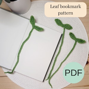 May include: Three green crocheted leaf bookmarks on a white surface with the text "Leaf bookmark pattern PDF" in a light green circle.