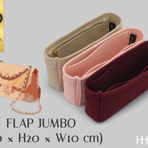 May include: Three felt bag organizers in beige, pink, and burgundy. The organizers have multiple compartments and a zipper closure. The organizers are designed to fit a large handbag, measuring 30 cm long, 20 cm high, and 10 cm wide. The text "HEZE" is visible on the burgundy organizer.