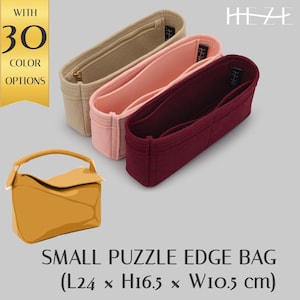 May include: Three felt bag inserts in beige, pink, and burgundy. The inserts are designed to fit inside a larger bag and have a puzzle edge design. The inserts are available in 30 color options. The text "HEZE" is printed on the top of the image. The text "WITH 30 COLOR OPTIONS" is printed on the left side of the image. A small yellow felt bag is shown below the inserts.