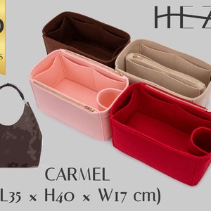 May include: A set of four felt bag organizers in brown, pink, beige, and red. The organizers have multiple compartments and a zipper closure. The organizers are designed to fit inside a handbag. The text "CARMEL (L35 x H40 x W17 cm)" is printed below the organizers.
