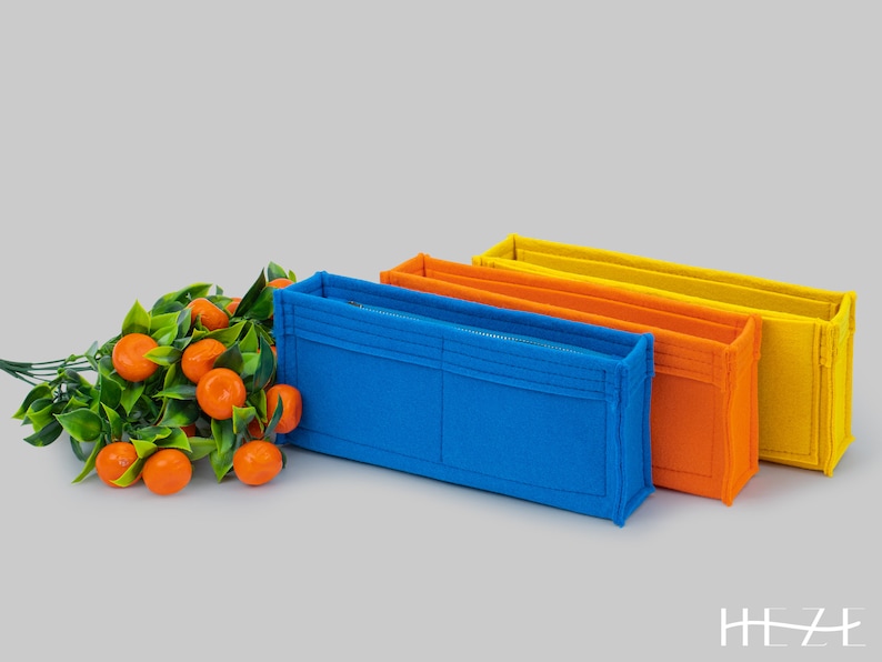 Elevate your CC 2.55 Reissue-224 with our meticulously crafted felt purse insert, offering a snug fit with dimensions tailored for your tote . This customizable purse insert promises not only organization but also a touch of personal flair.