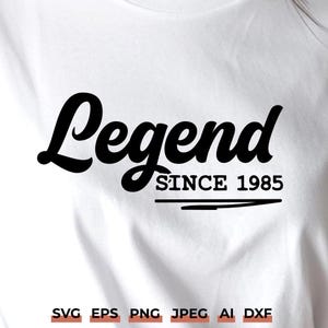 May include: Black and white graphic design with the text "Legend Since 1985".