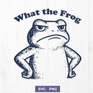 May include: A navy blue illustration of a disgruntled frog with its arms crossed. The text "What the Frog" arches above the frog. Below the frog are the letters "SVG PNG". The image is set against a white wood grain background.