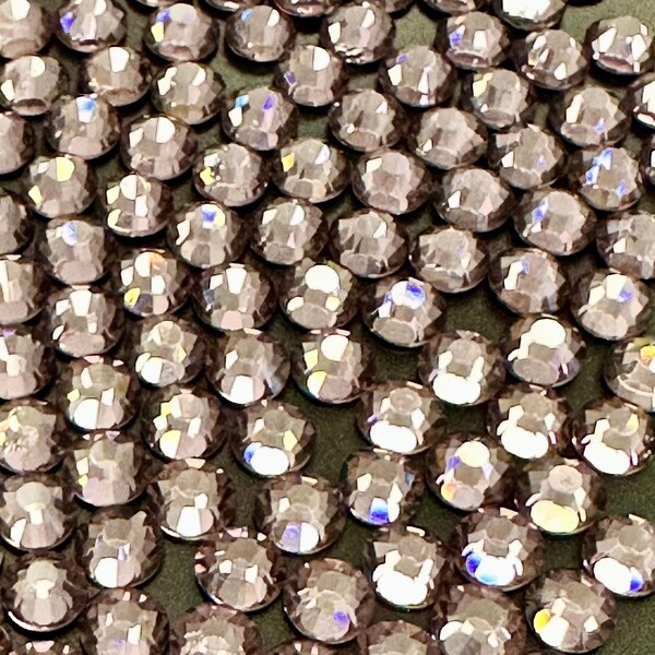 thumbnail interactive-video image 1 of Threadnanny Hotfix Rhinestone Lot - 14,400 Pieces, 3mm (SS10), 10 Assorted Colors, Iron-On Craft Bling 1 of 5