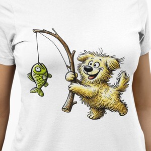 Funny Fishing Dog T-Shirt, Cute Yellow Fluffy Dog Catching Green Fish Graphic Tee, Unisex Gift for Anglers, Dog Lovers & Outdoor Humor Fans