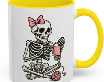 Skeleton Knitting Mug, Cute Spooky Yarn Lover Coffee Cup with Pink Bow and Crochet Art, Perfect for Halloween, Crafters & Goth Humor Fans
