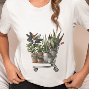Urban Botanical Garden Tee | Unisex Green Thumb Fashion T-Shirt with Indoor Plant & Shopping Cart Print|Eco-Friendly Gift for Plant Lovers