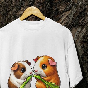 Cute Guinea Pigs Sharing Celery T-Shirt, Adorable Veggie-Loving Rodent Tee, Unisex Shirt for Animal Lovers, Pet Fans & Cavy Enthusiasts