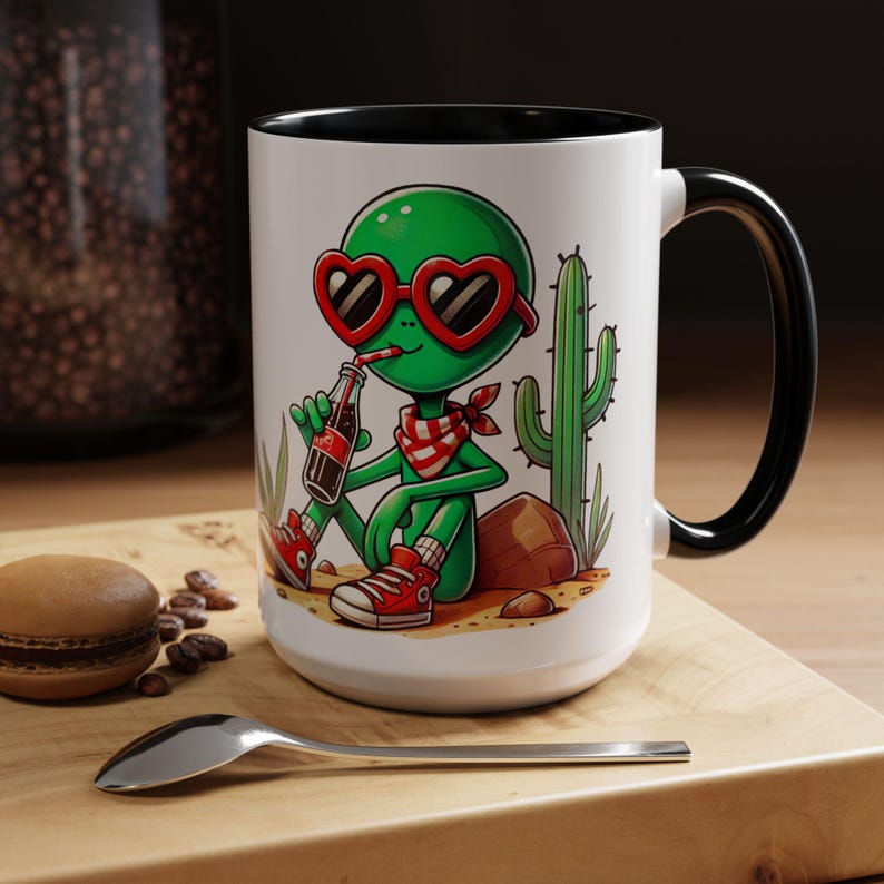 Alien in Desert Mug, Funny Green Alien Drinking Soda With Heart Glasses ...