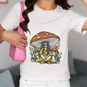 Cottagecore Mushroom Unisex T-Shirt, Woman Sitting Under Toadstool Novelty Tee, Fairycore Forest Aesthetic Shirt, Boho Vintage Top Gift