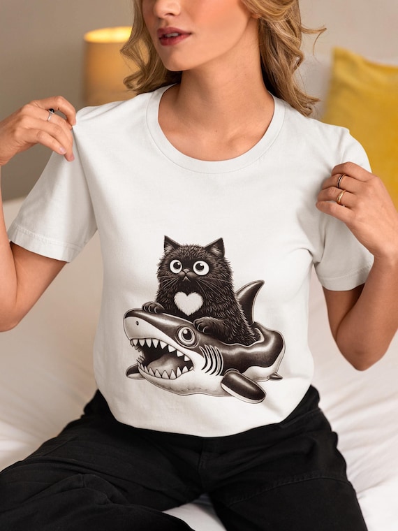 Cute Black Cat Riding Shark Inflatable T-Shirt, Funny Gothic Cat Shirt, Kawaii Cat Lover Gift, Shark Float Cat Tee, Unisex Cat Graphic Top