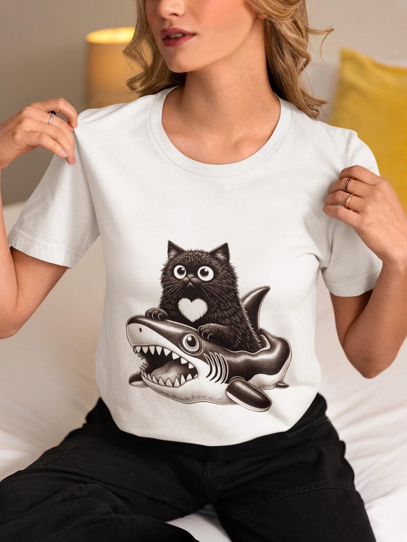 Cute Black Cat Riding Shark Inflatable T-Shirt, Funny Gothic Cat Shirt, Kawaii Cat Lover Gift, Shark Float Cat Tee, Unisex Cat Graphic Top