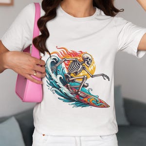 Unisex Skeleton Surfing T-Shirt, Flaming Skull Surfer Graphic Tee, Cool Skeleton on Waves Shirt, Retro Beach Style, Summer Surf Gift Top