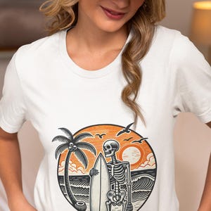 Surfing Skeleton Unisex T-Shirt with Sunset, Vintage Beach Vibes Novelty Tee, Skull Surfer with Surfboard Shirt, Retro Palm Tree&Ocean Waves