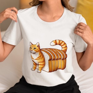 Funny Ginger Cat Loaf of Bread Unisex T-Shirt, Quirky Cat Lover Novelty Shirt, Freshly Baked Kitty Tee, Meme Design Top, Gift for Cat Fans
