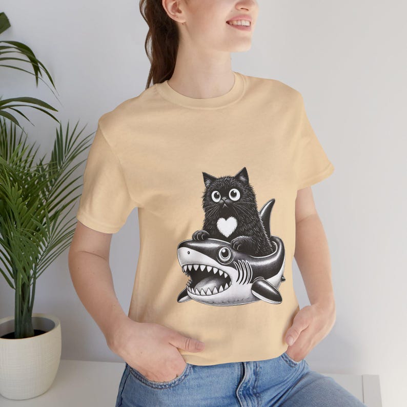 Cute Black Cat Riding Shark Inflatable T-Shirt, Funny Gothic Cat Shirt, Kawaii Cat Lover Gift, Shark Float Cat Tee, Unisex Cat Graphic Top
