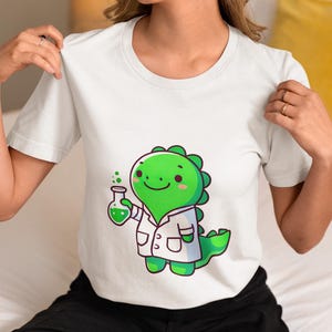Unisex Dinosaur Scientist Cartoon T-Shirt for Adults, Funny STEM Lover Tee, Quirky Science Lab Dino Graphic Shirt, Unique Gift Idea Top