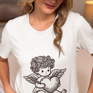 Cute Cherub with Heart Unisex T-Shirt, Romantic Baby Angel, Valentine Gift, Cupid Graphic Tee, Casual Novelty Shirt, Unique Love Gift Design