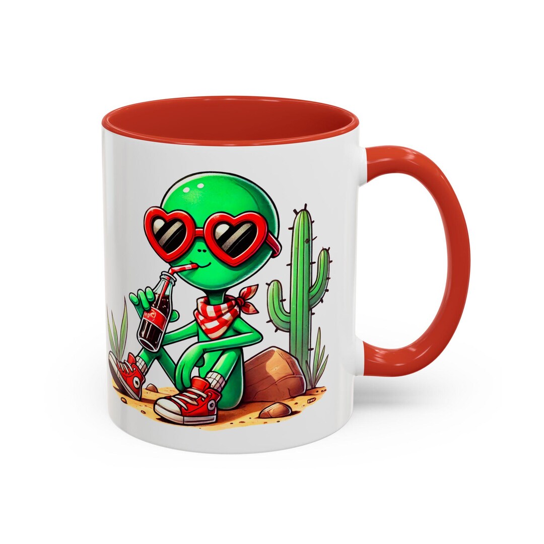 Alien in Desert Mug, Funny Green Alien Drinking Soda With Heart Glasses ...