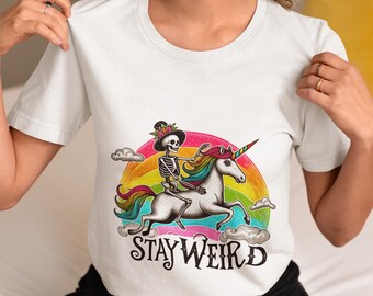 Skeleton Riding Rainbow Unicorn T-Shirt, Stay Weird Gothic Tee, Unisex Funny Halloween Shirt,Colorful Fantasy Skeleton Shirt,Unique Gift Top