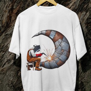 Welding the Moon T-Shirt, Surreal Sci-Fi Welder Graphic Tee, Funny Industrial Fantasy Art Shirt, Unisex Space Lover Top Gift for Makers
