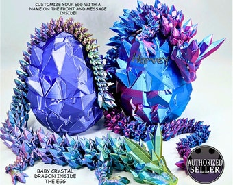 May include: Two iridescent blue, purple, and green crystal dragon eggs. One egg is open, revealing a dragon. The text reads: "CUSTOMIZE YOUR EGG WITH A NAME ON THE FRONT AND MESSAGE INSIDE!" and "BABY CRYSTAL DRAGON INSIDE THE EGG."