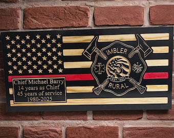 May include: A wooden plaque featuring an American flag design with a red stripe. The plaque includes text honoring Chief Michael Barry, with details of his service. The Imbler Rural Fire Department emblem is also displayed.