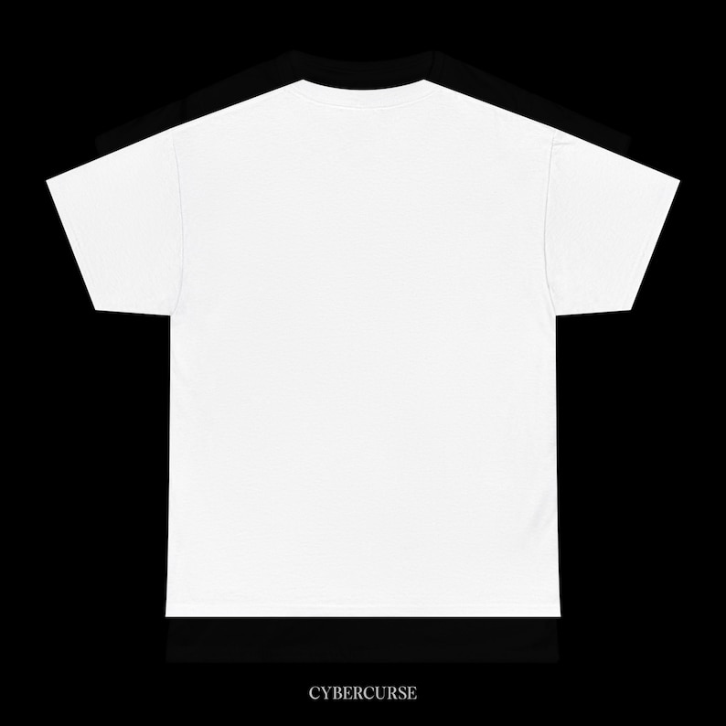 May include: Two t-shirts, one white and one black, are stacked on top of each other. The white t-shirt is in front, with the black t-shirt visible behind it. The text "CYBERCURSE" is printed in white at the bottom of the image.