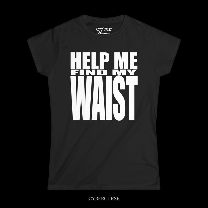 May include: Black t-shirt with the white text "HELP ME FIND MY WAIST". The shirt has a crew neck and short sleeves. The brand name "cybercurse" is printed at the bottom of the shirt.