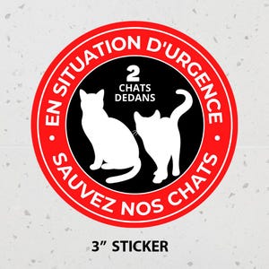 May include: A circular 3-inch sticker with a red border and a black centre. The text reads EN SITUATION D'URGENCE, 2 CHATS DEDANS, and SAUVEZ NOS CHATS in white. Two white cat silhouettes are positioned in the middle of the sticker design.