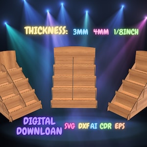 May include: Three wooden display stands with five shelves each. The stands are angled and have a scalloped edge. The text "THICKNESS: 3MM 4MM 1/8INCH" is displayed above the stands. The text "DIGITAL DOWNLOAD SVG DXF AI CDR EPS" is displayed below the stands.