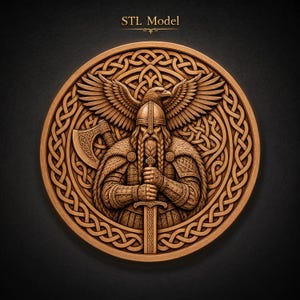 May include: A circular wooden relief carving featuring a central warrior figure with a braided beard, helmet, and armor, holding a sword. An eagle with spread wings sits above the warrior, and an axe is visible. The text STL Model is at the top.