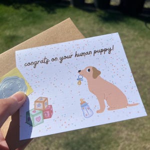 Felicitaciones por tu tarjeta de felicitación para baby shower de cachorro humano / Es un niño, es una niña, mamá perro, papá perro, amante de los animales, celebración, familia