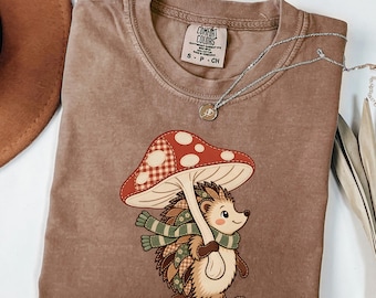 Cottagecore Hedgehog Shirt, Patchwork Mushroom Umbrella Graphic Tee, Whimsical Woodland Animal T-Shirt, Gingham and Floral Fall Aesthetic