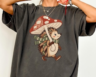Hedgehog Lover Gift Shirt, Cute Mushroom Umbrella T-Shirt, Cottagecore Animal Tee, Woodland Graphic Top, Autumn Nature Lover Birthday Gift