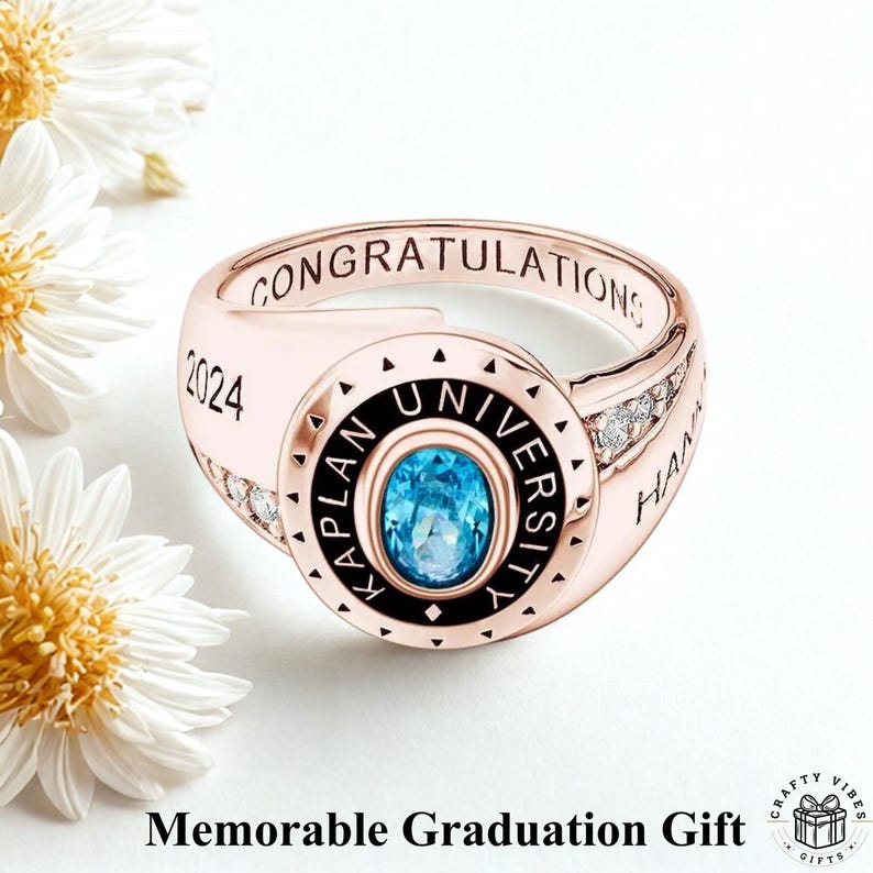 Custom name ring with birthstone accent, displayed on neutral background