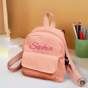 Zaino per il ritorno a scuola - Mini zaino con nome ricamato - Materiale in velluto a coste resistente, tasca frontale con cerniera, facile da trasportare per i più piccoli