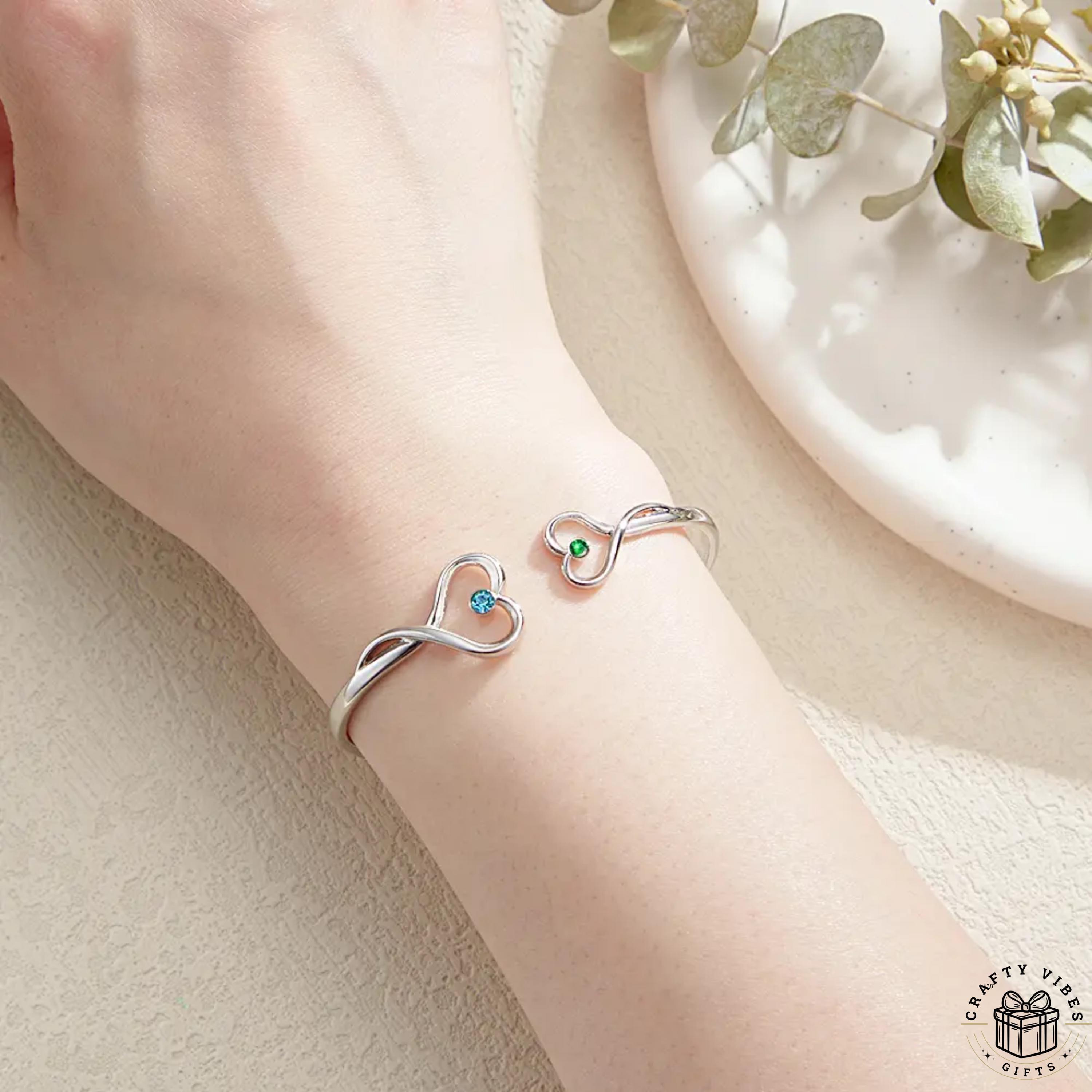23 Thoughtful Gift Ideas for Mom 19 Birthstone Bracelet Open Cuff: Double Heart-Shaped Gems - Engraved…