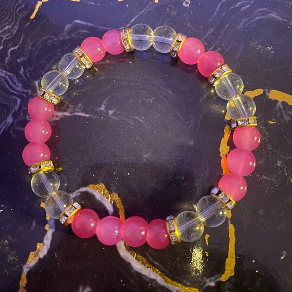 Pink and clear 8mm glass bead layerable  bracelet