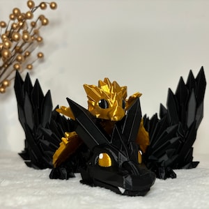2 in 1 Set - Small golden and large black movable dragon - Item no.: AD-BLAGO