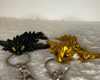 2 in 1 - Kleiner, schwarzer und goldener beweglicher Drache als Schlüsselanhänger - inspiriert von Fourth Wing Tairn und Andarna