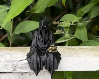 Black Grim Reaper figurine, seated with and without a teacup - Item no.: KS-BLA
